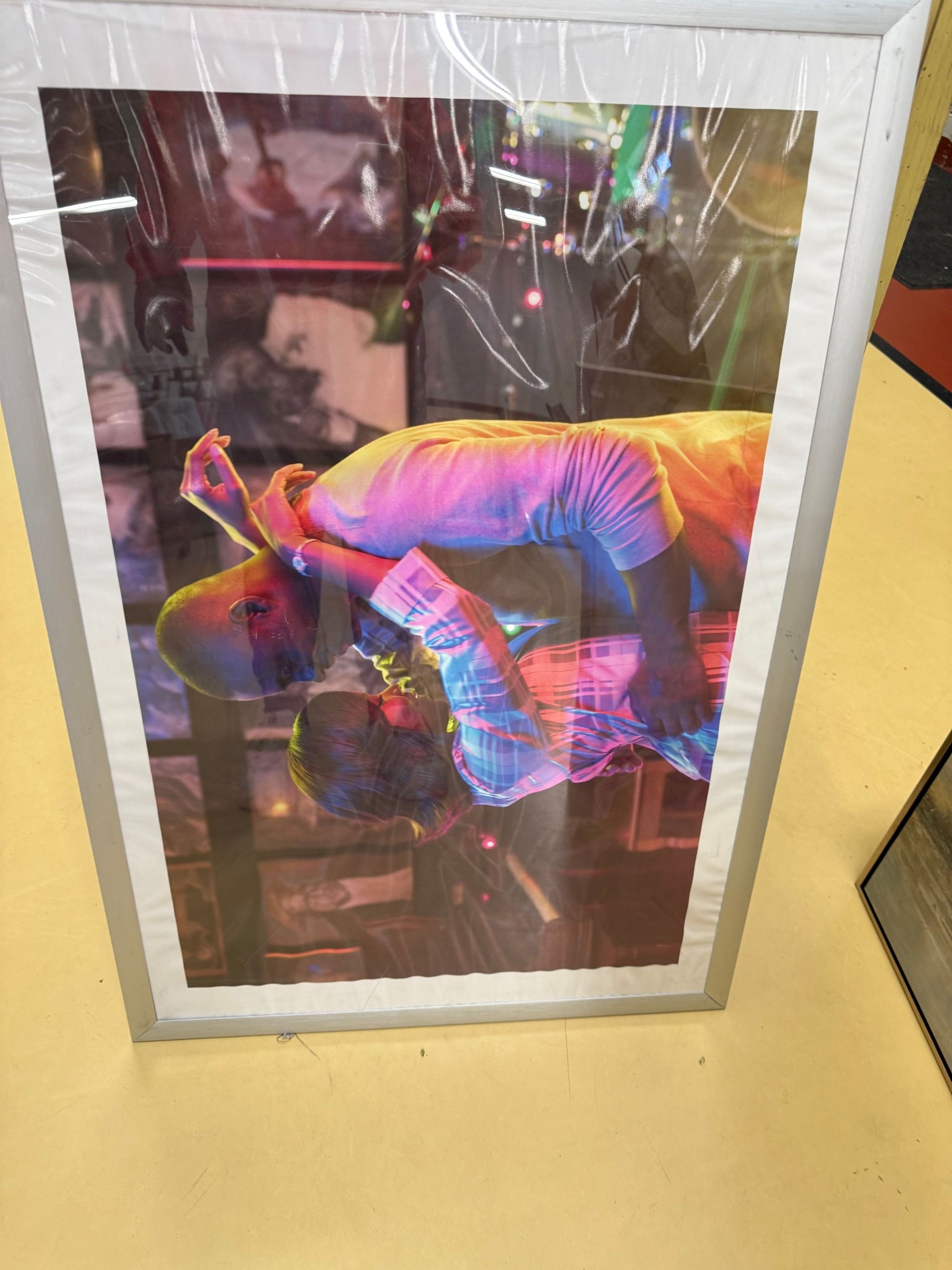 Framed Photograph of a Person in a Plaid Shirt
